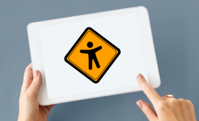 Two hands holding a tablet, the tablet shows a big icon with a stick figure symbolizing digital accessibility